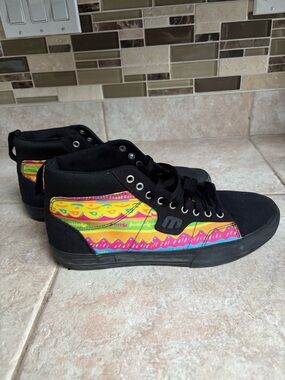 Etnies Black Skate Shoes with Yellow and Green Trim